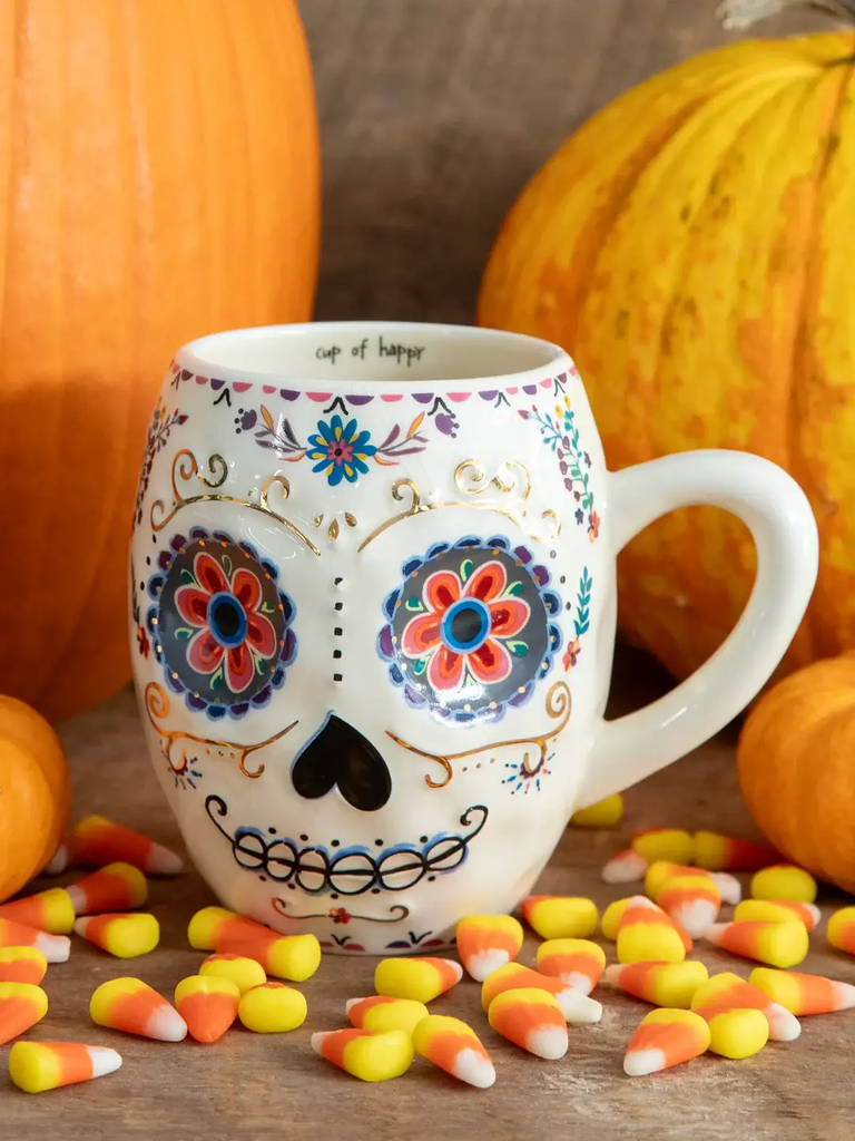 Taza popular con calavera de azúcar